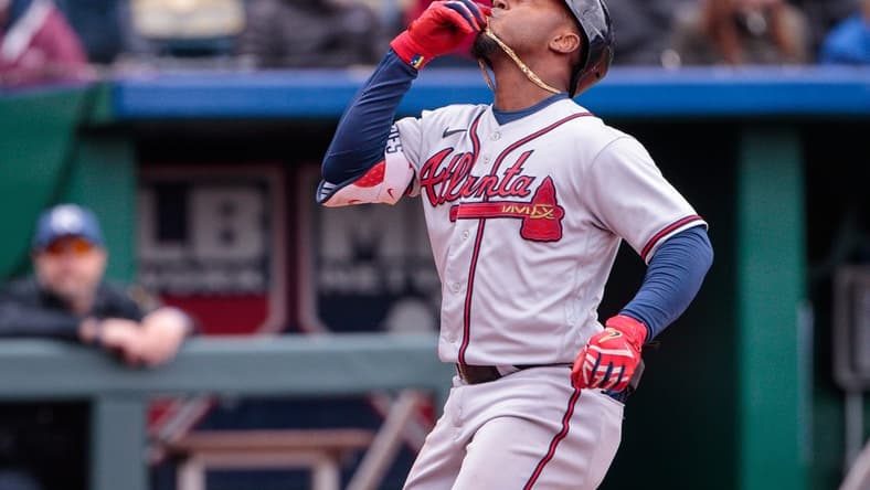 Apr 16, 2023; Kansas City, Missouri, USA; Atlanta Braves second baseman Ozzie Albies (1) reacts as he crosses home plate after hitting a home run during the fourth inning against the Kansas City Royals at Kauffman Stadium. Mandatory Credit: William Purnell-USA TODAY Sports
