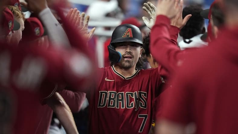 Apr 16, 2023; Miami, Florida, USA; Arizona Diamondbacks center fielder Corbin Carroll (7) celebrates a two-run home run in the sixth inning against the Miami Marlins at loanDepot Park. Mandatory Credit: Jim Rassol-USA TODAY Sports