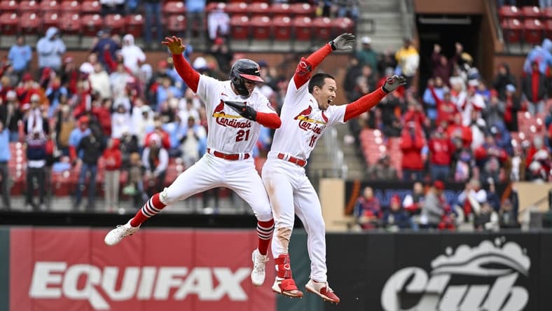 Apr 16, 2023; St. Louis, Missouri, USA;  St. Louis Cardinals shortstop Tommy Edman (19) celebrates with left fielder Lars Nootbaar (21) after hitting a walk-off one run single against the Pittsburgh Pirates during the tenth inning at Busch Stadium. Mandatory Credit: Jeff Curry-USA TODAY Sports