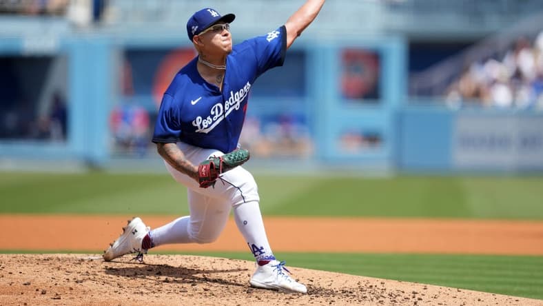 Apr 16, 2023; Los Angeles, California, USA; Los Angeles Dodgers starting pitcher Julio Urias (7) throws in the third inning against the Chicago Cubs at Dodger Stadium. Mandatory Credit: Kirby Lee-USA TODAY Sports