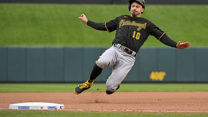 Apr 16, 2023; St. Louis, Missouri, USA;  Pittsburgh Pirates left fielder Bryan Reynolds (10) slides in at third against the St. Louis Cardinals during the seventh inning at Busch Stadium. Mandatory Credit: Jeff Curry-USA TODAY Sports