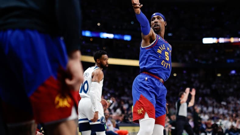 Apr 16, 2023; Denver, Colorado, USA; Denver Nuggets guard Kentavious Caldwell-Pope (5) gestures after a play in the second quarter against the Minnesota Timberwolves during game one of the 2023 NBA Playoffs at Ball Arena. Mandatory Credit: Isaiah J. Downing-USA TODAY Sports