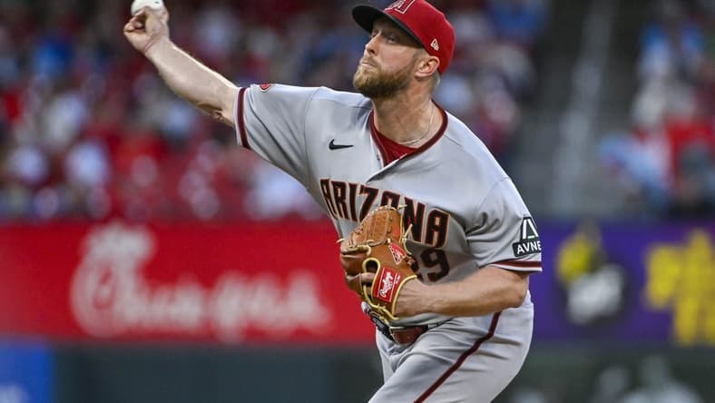 Apr 17, 2023; St. Louis, Missouri, USA;  Arizona Diamondbacks starting pitcher Merrill Kelly (29) pitches against the St. Louis Cardinals during the second inning at Busch Stadium. Mandatory Credit: Jeff Curry-USA TODAY Sports