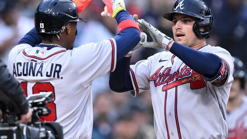 Apr 17, 2023; San Diego, California, USA; Atlanta Braves third baseman Austin Riley (right) is congratulated by right fielder Ronald Acuna (13) after hitting a two-run home run against the San Diego Padres during the first inning at Petco Park. Mandatory Credit: Orlando Ramirez-USA TODAY Sports
