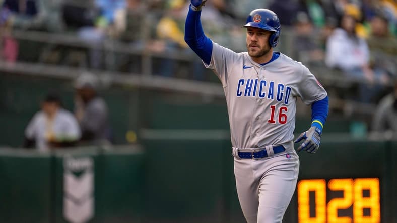 Apr 17, 2023; Oakland, California, USA;  Chicago Cubs third baseman Patrick Wisdom (16) celebrates as he touches home plate after hitting a solo home run against the Oakland Athletics during the second inning at RingCentral Coliseum. Mandatory Credit: Neville E. Guard-USA TODAY Sports