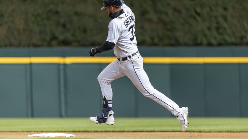Apr 18, 2023; Detroit, Michigan, USA; Detroit Tigers center fielder Riley Greene (31) hits a solo home run against the Cleveland Guardians in the sixth inning at Comerica Park. Mandatory Credit: David Reginek-USA TODAY Sports
