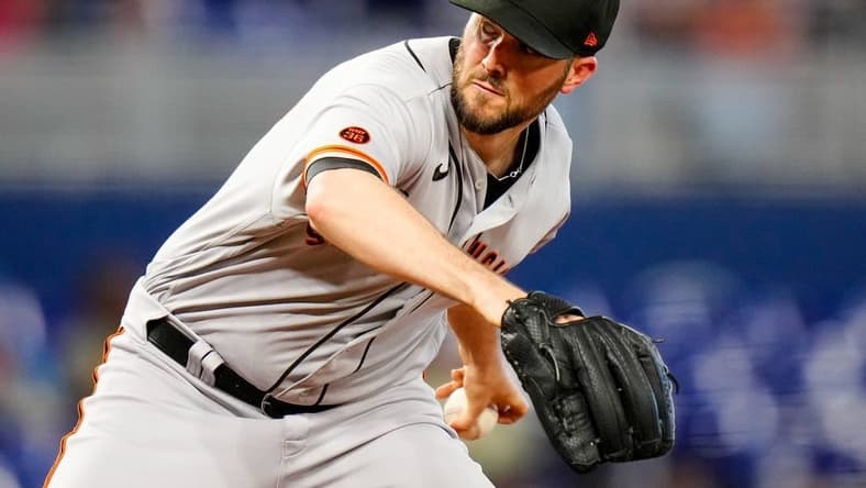 Apr 18, 2023; Miami, Florida, USA; San Francisco Giants starting pitcher Alex Wood (57) throws a pitch against the Miami Marlins during the first inning at loanDepot Park. Mandatory Credit: Rich Storry-USA TODAY Sports