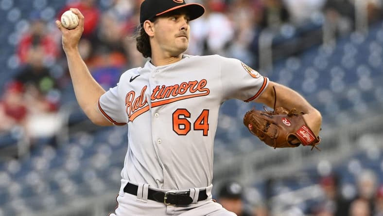 Apr 18, 2023; Washington, District of Columbia, USA; Baltimore Orioles starting pitcher Dean Kremer (64) throws to the Washington Nationals during the first inning at Nationals Park. Mandatory Credit: Brad Mills-USA TODAY Sports