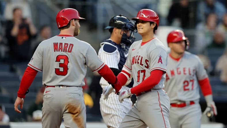 Apr 18, 2023; Bronx, New York, USA; Los Angeles Angels designated hitter Shohei Ohtani (17) celebrates his two run home run against the New York Yankees with left fielder Taylor Ward (3) during the first inning at Yankee Stadium. Mandatory Credit: Brad Penner-USA TODAY Sports