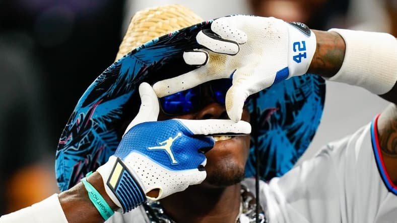 Apr 18, 2023; Miami, Florida, USA; Miami Marlins center fielder Jazz Chisholm Jr. (2) celebrates hitting a three run home run against the San Francisco Giants during the fourth inning at loanDepot Park. Mandatory Credit: Rich Storry-USA TODAY Sports