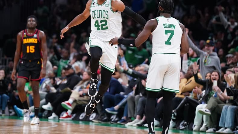 Apr 18, 2023; Boston, Massachusetts, USA; Boston Celtics center Al Horford (42) reacts after his three point basket against the bAtlanta Hawks in the third quarter during game two of the 2023 NBA playoffs at TD Garden. Mandatory Credit: David Butler II-USA TODAY Sports