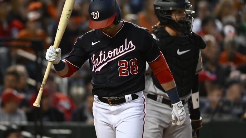Apr 18, 2023; Washington, District of Columbia, USA; Washington Nationals right fielder Lane Thomas (28) reacts after striking out during the third inning at Nationals Park. Mandatory Credit: Brad Mills-USA TODAY Sports