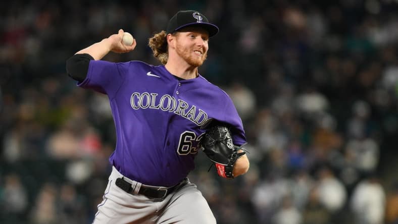 Apr 16, 2023; Seattle, Washington, USA; Colorado Rockies starting pitcher Noah Davis (63) pitches to the Seattle Mariners at T-Mobile Park. Mandatory Credit: Steven Bisig-USA TODAY Sports