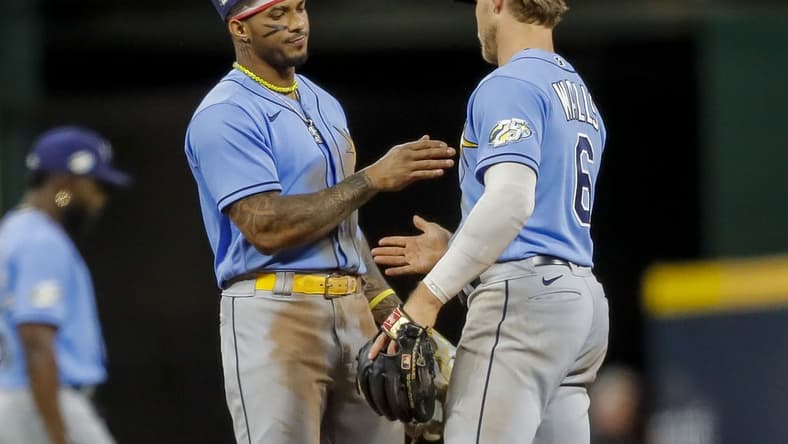 Apr 18, 2023; Cincinnati, Ohio, USA; Tampa Bay Rays shortstop Wander Franco (5) high fives second baseman Taylor Walls (6) after the victory over the Cincinnati Reds at Great American Ball Park. Mandatory Credit: Katie Stratman-USA TODAY Sports