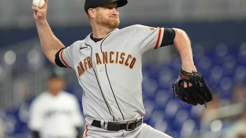 Apr 19, 2023; Miami, Florida, USA;  San Francisco Giants starting pitcher Alex Cobb (38) pitches against the Miami Marlins in the first inning at loanDepot Park. Mandatory Credit: Jim Rassol-USA TODAY Sports