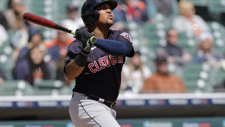 Apr 19, 2023; Detroit, Michigan, USA;  Cleveland Guardians third baseman Jose Ramirez (11) hits a three run home run in the sixth inning against the Detroit Tigers at Comerica Park. Mandatory Credit: Rick Osentoski-USA TODAY Sports