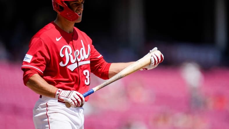 Cincinnati Reds third baseman Jason Vosler (32) rubs his bat after striking out in the sixth inning of the MLB Interleague game between the Cincinnati Reds and the Tampa Bay Rays at Great American Ball Park in downtown Cincinnati on Wednesday, April 19, 2023.

Tampa Bay Rays At Cincinnati Reds