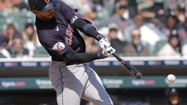 Apr 19, 2023; Detroit, Michigan, USA;  Cleveland Guardians second baseman Gabriel Arias (13) hits a single in the ninth inning against the Detroit Tigers at Comerica Park. Mandatory Credit: Rick Osentoski-USA TODAY Sports