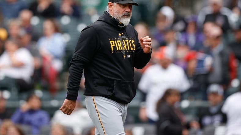 Apr 19, 2023; Denver, Colorado, USA; Pittsburgh Pirates manager Derek Shelton (17) walks to the dugout in the fifth inning against the Colorado Rockies at Coors Field. Mandatory Credit: Isaiah J. Downing-USA TODAY Sports