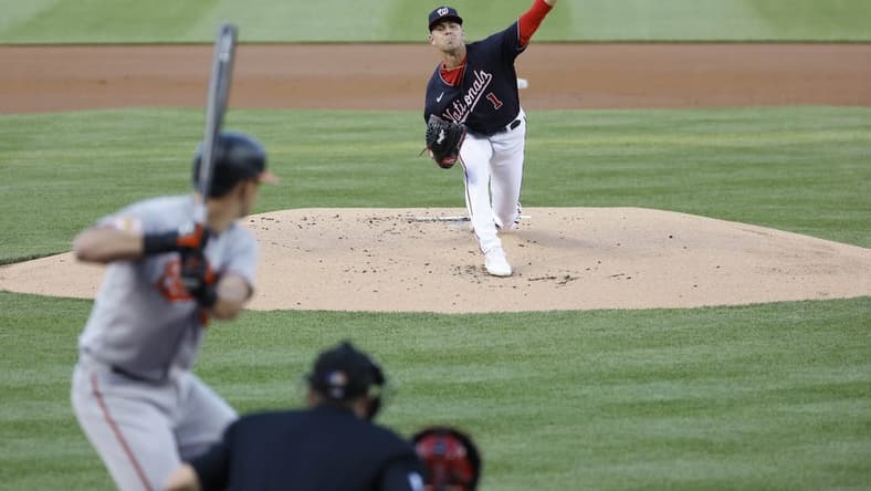 Apr 19, 2023; Washington, District of Columbia, USA; Washington Nationals starting pitcher MacKenzie Gore (1) pitches against Baltimore Orioles first baseman Ryan Mountcastle (6) during the first inning at Nationals Park. Mandatory Credit: Geoff Burke-USA TODAY Sports