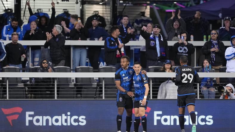 Apr 15, 2023; San Jose, California, USA; San Jose Earthquakes forward Cristian Espinoza (right) celebrates with forward Jeremy Ebobisse (left) after scoring a goal against Sporting Kansas City during the first half at PayPal Park. Mandatory Credit: Darren Yamashita-USA TODAY Sports