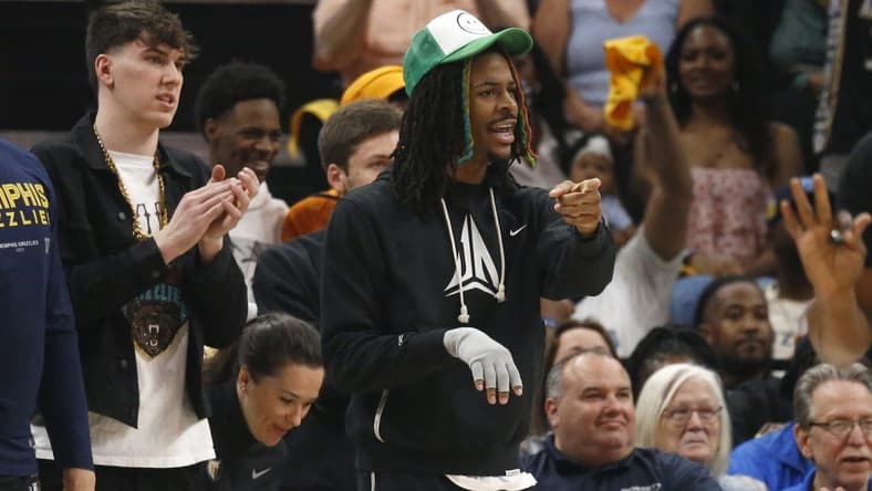 Apr 19, 2023; Memphis, Tennessee, USA; Memphis Grizzlies guard Ja Morant (12) gives direction from the bench during the first half during game two of the 2023 NBA playoffs against the Los Angeles Lakers at FedExForum. Mandatory Credit: Petre Thomas-USA TODAY Sports