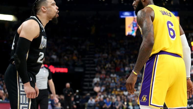 Apr 19, 2023; Memphis, Tennessee, USA; Memphis Grizzlies forward Dillon Brooks (24) and Los Angeles Lakers forward LeBron James (6) react during the second half during game two of the 2023 NBA playoffs at FedExForum. Mandatory Credit: Petre Thomas-USA TODAY Sports