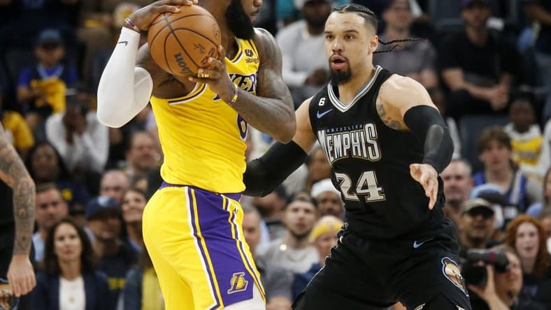 Memphis Grizzlies forward Dillon Brooks (24) defends Los Angeles Lakers forward LeBron James (6) during the second half during game two of the 2023 NBA playoffs at FedExForum. Mandatory Credit: Petre Thomas-USA TODAY Sports