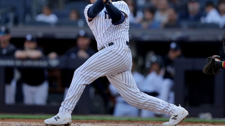Apr 20, 2023; Bronx, New York, USA; New York Yankees catcher Jose Trevino (39) follows through on a three run double against the Los Angeles Angels during the first inning at Yankee Stadium. Mandatory Credit: Brad Penner-USA TODAY Sports