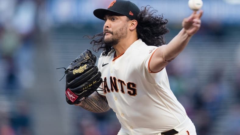 Apr 20, 2023; San Francisco, California, USA;  San Francisco Giants starting pitcher Sean Manaea (52) throws against the New York Mets during the first inning at Oracle Park. Mandatory Credit: John Hefti-USA TODAY Sports