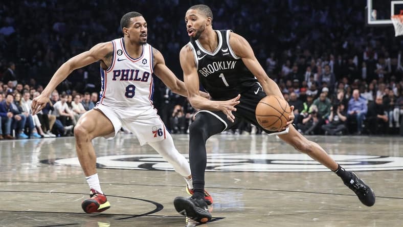 Apr 20, 2023; Brooklyn, New York, USA; Brooklyn Nets forward Mikal Bridges (1) looks to drive past Philadelphia 76ers guard De'Anthony Melton (8) during game three of the 2023 NBA playoffs at Barclays Center. Mandatory Credit: Wendell Cruz-USA TODAY Sports