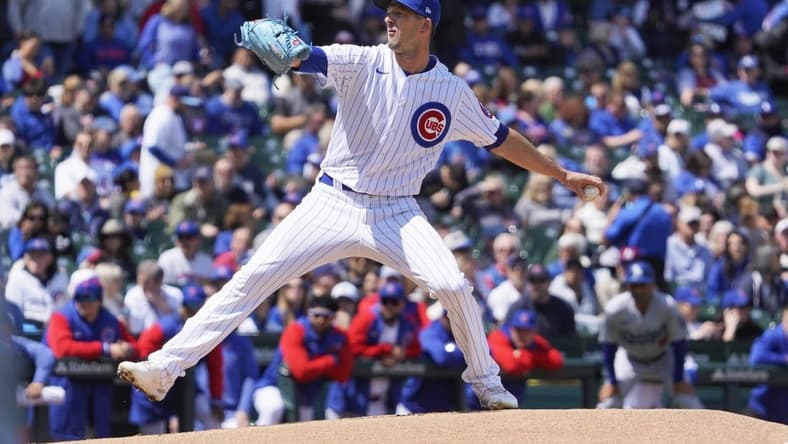 Apr 21, 2023; Chicago, Illinois, USA; Chicago Cubs starting pitcher Drew Smyly (11) throws the ball against the Los Angeles Dodgers during the first inning at Wrigley Field. Mandatory Credit: David Banks-USA TODAY Sports