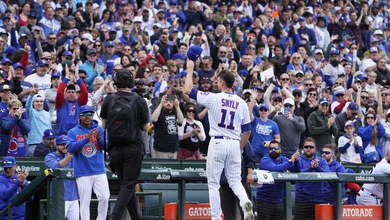Apr 21, 2023; Chicago, Illinois, USA; Chicago Cubs starting pitcher Drew Smyly (11) tips his cap as he leaves the game against the Los Angeles Dodgers during the eighth inning at Wrigley Field. Mandatory Credit: David Banks-USA TODAY Sports