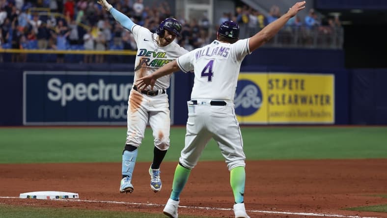 Apr 21, 2023; St. Petersburg, Florida, USA; Tampa Bay Rays second baseman Brandon Lowe (8) celebrates as he hits the game winning walk off 2-run home run against the Chicago White Sox at Tropicana Field. Mandatory Credit: Kim Klement-USA TODAY Sports