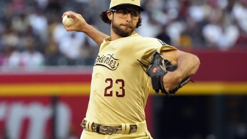 Apr 21, 2023; Phoenix, Arizona, USA; Arizona Diamondbacks pitcher Zac Gallen (23) throws against the San Diego Padres in the first inning at Chase Field. Mandatory Credit: Rick Scuteri-USA TODAY Sports