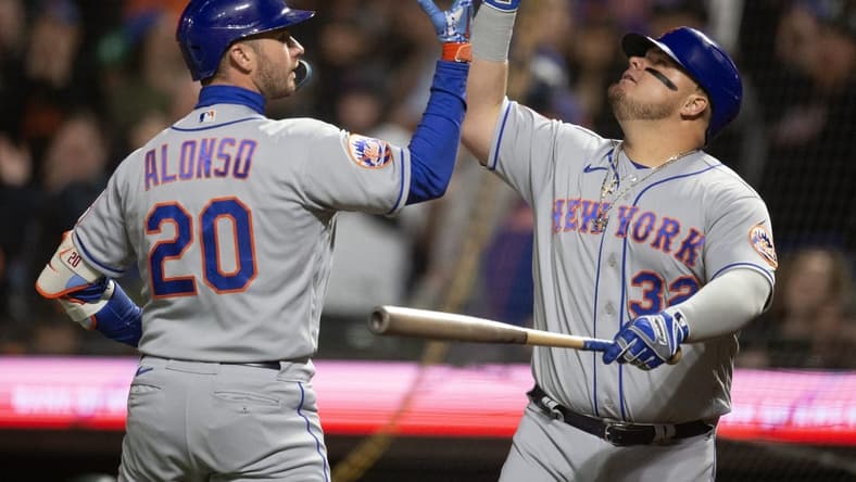 Apr 21, 2023; San Francisco, California, USA; New York Mets first baseman Pete Alonso (20) celebrates with designated hitter Daniel Vogelbach (32) after hitting a two-run home run against the San Francisco Giants during the fifth inning at Oracle Park. Mandatory Credit: D. Ross Cameron-USA TODAY Sports