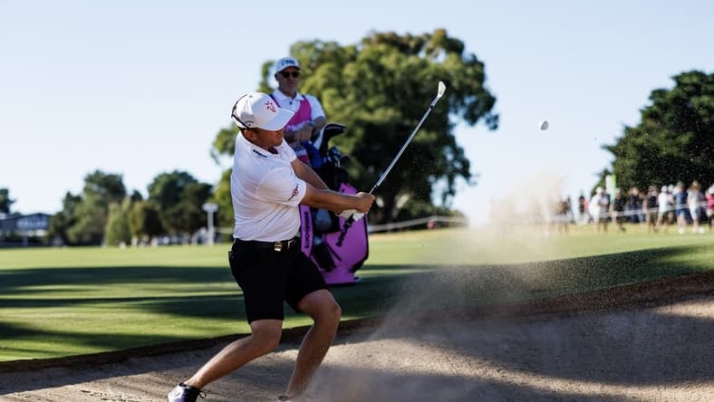 Apr 22, 2023; Adelaide,South Australia, AUS; Talor Gooch of Team Rangegoats hits a bunker shot during the second round of LIV Golf Adelaide golf tournament at Grange Golf Club. Mandatory Credit: Mike Frey-USA TODAY Sports