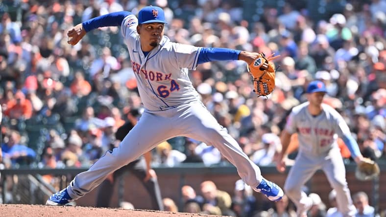 Apr 22, 2023; San Francisco, California, USA; New York Mets pitcher Edwin Uceta (64) throws a pitch against the San Francisco Giants during the sixth inning at Oracle Park. Mandatory Credit: Robert Edwards-USA TODAY Sports