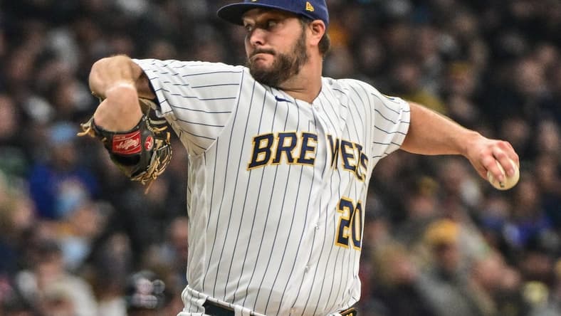 Apr 22, 2023; Milwaukee, Wisconsin, USA; Milwaukee Brewers pitcher Wade Miley (20) throws a pitch in the second inning against the Boston Red Sox at American Family Field. Mandatory Credit: Benny Sieu-USA TODAY Sports