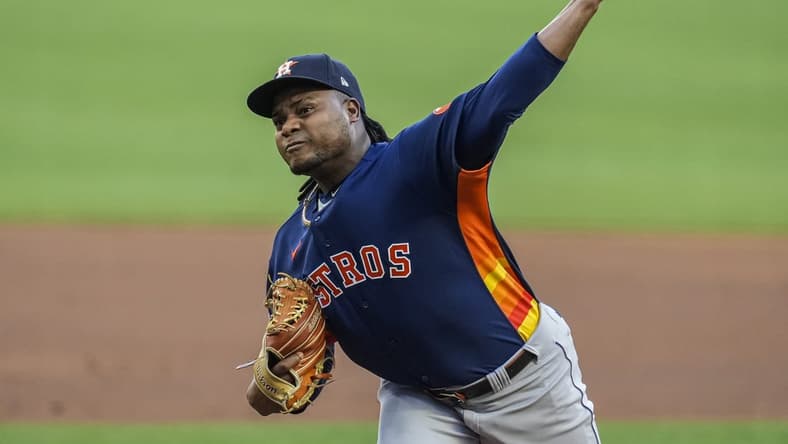 Apr 22, 2023; Cumberland, Georgia, USA; Houston Astros starting pitcher Framber Valdez (59) pitches against the Atlanta Braves during the first inning at Truist Park. Mandatory Credit: Dale Zanine-USA TODAY Sports