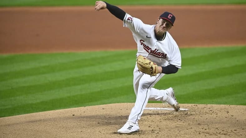 Apr 22, 2023; Cleveland, Ohio, USA; Cleveland Guardians starting pitcher Zach Plesac (34) delivers a pitch in the first inning against the Miami Marlins at Progressive Field. Mandatory Credit: David Richard-USA TODAY Sports