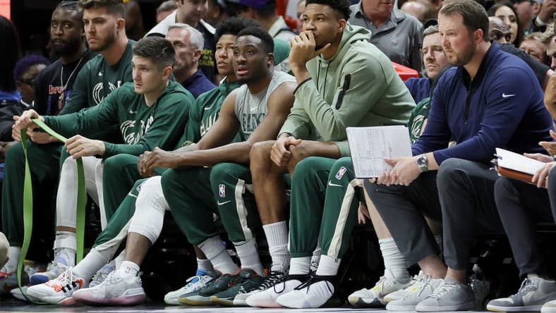 Apr 22, 2023; Miami, Florida, USA; Milwaukee Bucks forward Giannis Antetokounmpo (34) looks on from the bench in the second quarter against the Miami Heat during game three of the 2023 NBA Playoffs at Kaseya Center. Mandatory Credit: Sam Navarro-USA TODAY Sports