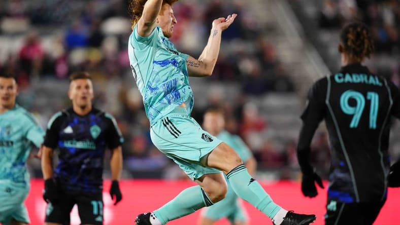 Apr 22, 2023; Commerce City, Colorado, USA; St. Louis City defender Tim Parker (26) heads the ball during first half at Dick's Sporting Goods Park. Mandatory Credit: Dharmesh Patel-USA TODAY Sports