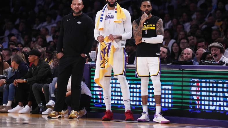 Apr 22, 2023; Los Angeles, California, USA; Los Angeles Lakers coach Darvin Ham (left), forward Anthony Davis (3) and guard D'Angelo Russell (1) react against the Memphis Grizzlies in the fourth quarter during game three of the 2023 NBA playoffs at Crypto.com Arena. Mandatory Credit: Kirby Lee-USA TODAY Sports