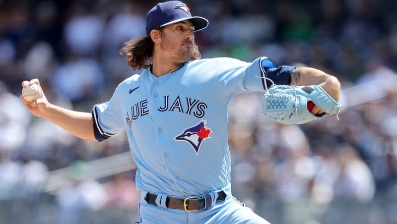 Apr 23, 2023; Bronx, New York, USA; Toronto Blue Jays starting pitcher Kevin Gausman (34) pitches against the New York Yankees during the first inning at Yankee Stadium. Mandatory Credit: Brad Penner-USA TODAY Sports