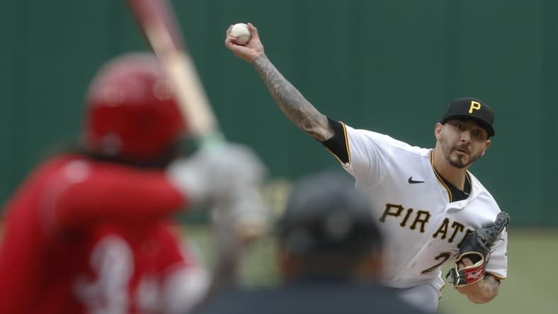 Apr 23, 2023; Pittsburgh, Pennsylvania, USA; Pittsburgh Pirates starting pitcher Vince Velasquez (27) pitches to Cincinnati Reds second baseman Jonathan India (6) during the first inning at PNC Park. Mandatory Credit: Charles LeClaire-USA TODAY Sports