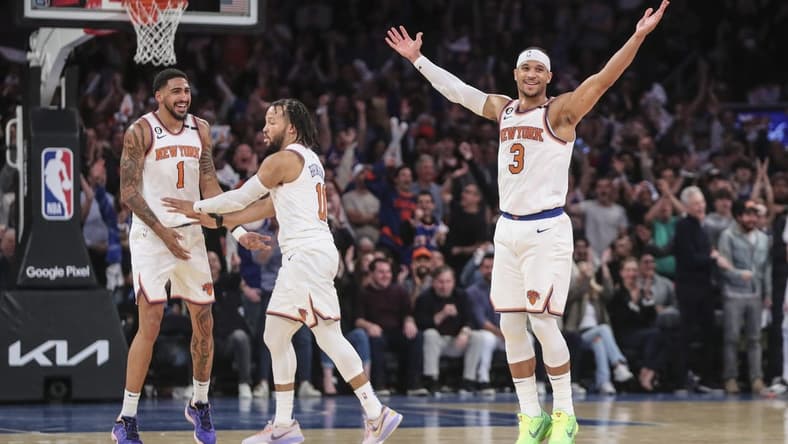Apr 23, 2023; New York, New York, USA; New York Knicks forward Obi Toppin (1), and guards Jalen Brunson (11) and  Josh Hart (3) celebrates during game four of the 2023 NBA playoffs against the Cleveland Cavaliers at Madison Square Garden. Mandatory Credit: Wendell Cruz-USA TODAY Sports