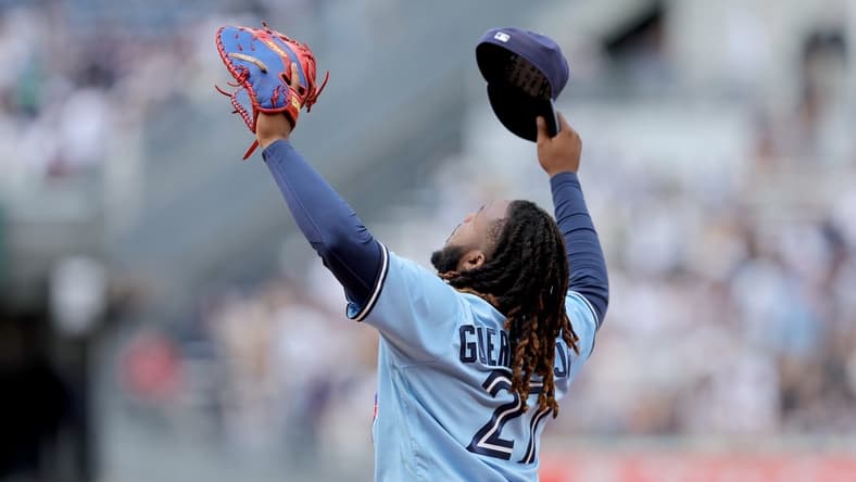 Apr 23, 2023; Bronx, New York, USA; Toronto Blue Jays first baseman Vladimir Guerrero Jr. (27) reacts after defeating the New York Yankees at Yankee Stadium. Mandatory Credit: Brad Penner-USA TODAY Sports