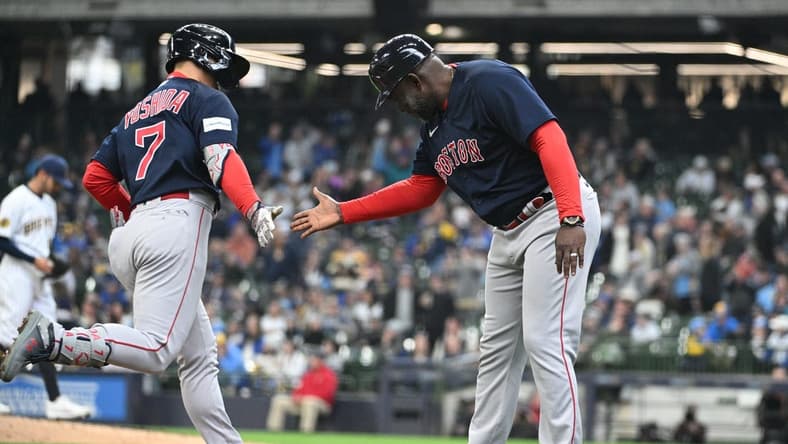 Apr 23, 2023; Milwaukee, Wisconsin, USA;Boston Red Sox left fielder Masataka Yoshida (7) celebrates with Boston Red Sox third base coach Carlos Febles (53) after hitting a home run against the Milwaukee Brewers in the eighth inning at American Family Field. Mandatory Credit: Michael McLoone-USA TODAY Sports