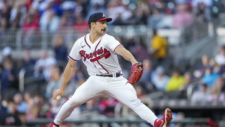 Apr 24, 2023; Cumberland, Georgia, USA; Atlanta Braves starting pitcher Spencer Strider (99) pitches against the Miami Marlins during the first inning at Truist Park. Mandatory Credit: Dale Zanine-USA TODAY Sports